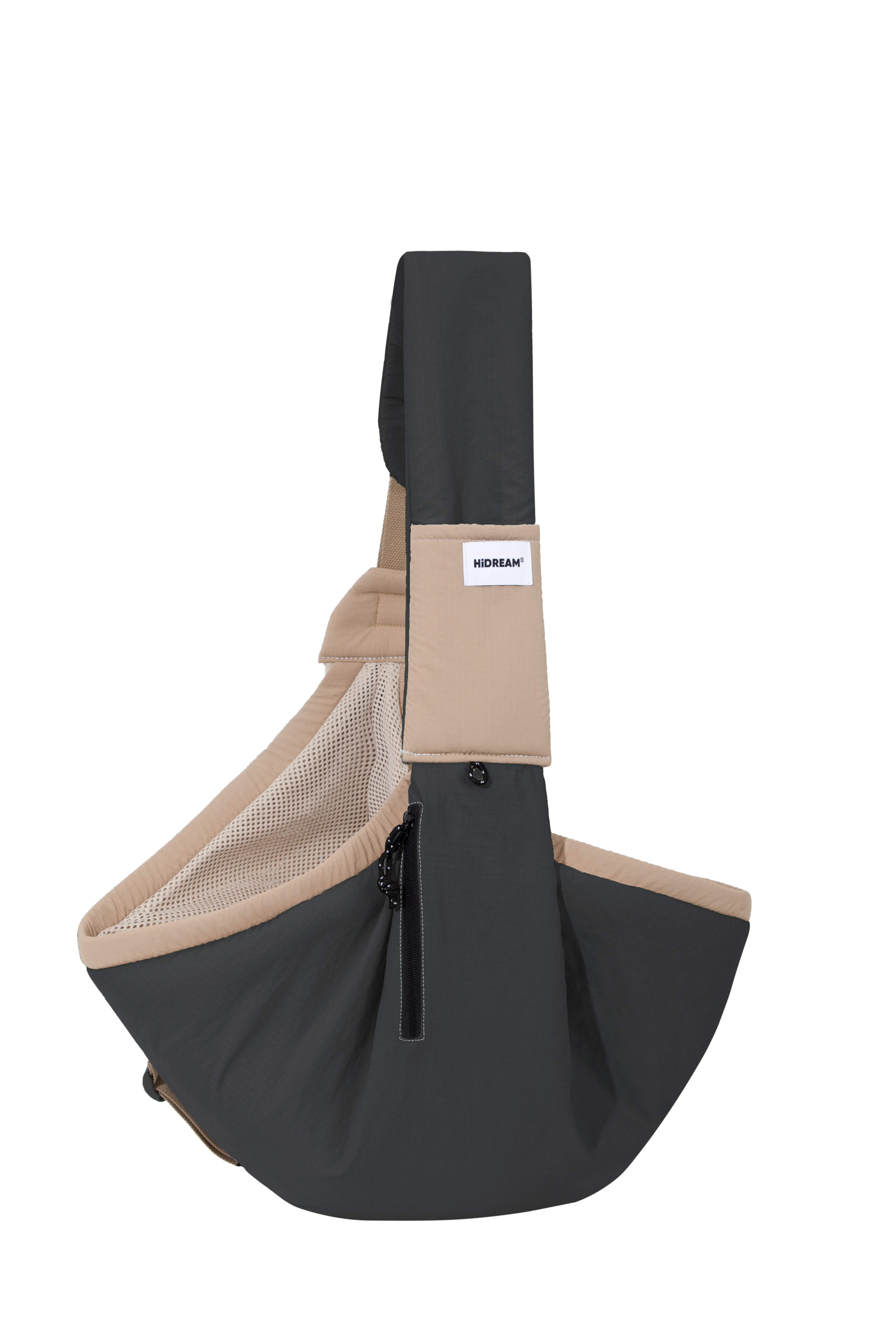 Black and beige pet sling bag with a visible brand label on a white background